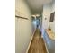 Hallway with wood flooring and decor; welcome guests into this inviting space at 625 North Waccamaw Dr. # 101, Murrells Inlet, SC 29576