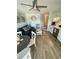 Cozy living room featuring a kitchen, dining area, sofa, and decor at 625 North Waccamaw Dr. # 101, Murrells Inlet, SC 29576