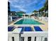 Sparkling community pool with inviting lounge chairs, ideal for summer relaxation at 625 North Waccamaw Dr. # 101, Murrells Inlet, SC 29576