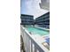 Community pool with lounge chairs for residents, surrounded by condo buildings at 625 North Waccamaw Dr. # 101, Murrells Inlet, SC 29576