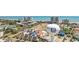 Aerial view showcasing North Myrtle Beach, high rise buildings, homes, and water tower at 6302 N Ocean Blvd. # G-3, North Myrtle Beach, SC 29582
