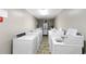 Community laundry room with multiple washing machines for residents at 6302 N Ocean Blvd. # G-3, North Myrtle Beach, SC 29582