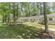 Charming single-story home with a welcoming walkway and lush green surroundings, perfect for peaceful living at 6734 Blue Heron Blvd. # 104, Myrtle Beach, SC 29588