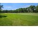 Lush green golf course with manicured fairways and pristine bunkers, perfect for golf enthusiasts at 6734 Blue Heron Blvd. # 104, Myrtle Beach, SC 29588