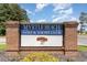 Elegant brick entrance sign for Myrtle Beach Golf & Yacht Club, welcoming residents and visitors at 6734 Blue Heron Blvd. # 104, Myrtle Beach, SC 29588