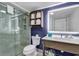 Contemporary bathroom featuring a large mirror and glass door to shower at 7100 N Ocean Blvd. # 317, Myrtle Beach, SC 29572