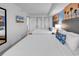 Bedroom featuring two beds, mounted television and open doorway to bedroom at 7100 N Ocean Blvd. # 317, Myrtle Beach, SC 29572