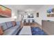 Open-concept living room with view to dining and kitchen areas at 7100 N Ocean Blvd. # 317, Myrtle Beach, SC 29572