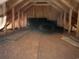 Unfinished attic with wooden beams and plywood floor at 753 Bucklin Loop, Myrtle Beach, SC 29579