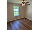 Cozy bedroom featuring vinyl floors and a window overlooking the backyard at 753 Bucklin Loop, Myrtle Beach, SC 29579