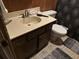 Bathroom featuring a vanity with storage, toilet, and tile flooring at 8 Ryan Ln., Myrtle Beach, SC 29579