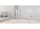 Bedroom featuring a double bed, a vanity with mirror, and double-door closet at 8077 Fort Hill Way, Myrtle Beach, SC 29579