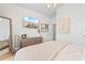 Bedroom featuring neutral walls, a large mirror, a TV, and full sized bed at 8077 Fort Hill Way, Myrtle Beach, SC 29579