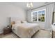 Bedroom featuring a bright window, neutral walls, and a full size bed at 8077 Fort Hill Way, Myrtle Beach, SC 29579