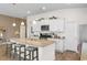 Bright kitchen with granite countertops, a center island, and stainless steel appliances at 8077 Fort Hill Way, Myrtle Beach, SC 29579