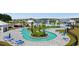 Fantastic community pool with lazy river, lush landscaping, and plenty of lounge chairs at 8077 Fort Hill Way, Myrtle Beach, SC 29579