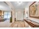 Inviting entryway with a decorative front door, wood-look flooring, and stylish interior decor at 8209 Timber Ridge Rd., Conway, SC 29526