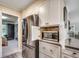 The kitchen features white cabinets, stainless steel appliances and a microwave hidden inside the cabinetry at 8209 Timber Ridge Rd., Conway, SC 29526