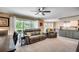 Open-concept living area blending a casual seating area with a view of the kitchen at 8209 Timber Ridge Rd., Conway, SC 29526