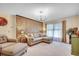 Comfortable living room with patterned wallpaper, sofa set, and natural light at 8209 Timber Ridge Rd., Conway, SC 29526