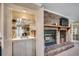 Living area showing a fireplace, wet bar, and ample shelving at 8209 Timber Ridge Rd., Conway, SC 29526