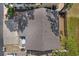 Aerial view of the home showcasing the roof, balcony, and surrounding landscape and neighborhood at 829 9Th Ave. S, North Myrtle Beach, SC 29582