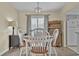 Eat-in dining area with a round table, bright light fixture, and neutral decor at 829 9Th Ave. S, North Myrtle Beach, SC 29582