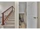 Hallway features a carpeted staircase and storage space underneath at 829 9Th Ave. S, North Myrtle Beach, SC 29582