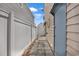 Side yard area with privacy fence and stone pavers between houses at 829 9Th Ave. S, North Myrtle Beach, SC 29582