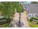 Beautiful street view showcasing well-maintained properties and lush landscaping at 829 9Th Ave. S, North Myrtle Beach, SC 29582