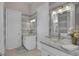 Bathroom featuring double sinks, glass vessel sinks, and tile flooring at 837 Bluff View Dr., Myrtle Beach, SC 29579