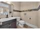 Tastefully decorated half bath with a decorative mirror and modern fixtures at 837 Bluff View Dr., Myrtle Beach, SC 29579