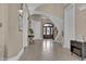 Elegant foyer featuring tile flooring, staircase, and decorative accents that create a welcoming ambiance at 837 Bluff View Dr., Myrtle Beach, SC 29579