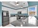 Well-lit kitchen with granite countertops, stainless steel appliances, and white cabinets at 837 Bluff View Dr., Myrtle Beach, SC 29579