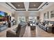 Comfortable living room featuring a decorative ceiling, wood floors, and ample seating for relaxation at 837 Bluff View Dr., Myrtle Beach, SC 29579