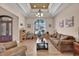 Cozy living room featuring classic furniture, a decorative ceiling, and natural light for a comfortable setting at 837 Bluff View Dr., Myrtle Beach, SC 29579