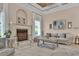 Bright living room with a tiled fireplace, comfortable seating, and nice decor at 837 Bluff View Dr., Myrtle Beach, SC 29579