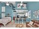 Open concept living area features high ceilings, a combined living, kitchen and bedroom, modern decor, and ample natural light at 837 Bluff View Dr., Myrtle Beach, SC 29579