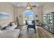 Bright home office with a large arched window, ceiling fan, and hardwood floors at 837 Bluff View Dr., Myrtle Beach, SC 29579