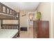 This bedroom features a bunk bed, chest of drawers, and a bathroom with a sink and commode at 8796 Cloister Dr. # B, Surfside Beach, SC 29575
