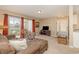 Spacious living room with comfortable furniture, access to the front door and a view of the outdoor space at 8796 Cloister Dr. # B, Surfside Beach, SC 29575
