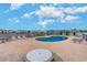 Community pool offers lounge chairs and tables for residents to enjoy a relaxing atmosphere at 8796 Cloister Dr. # B, Surfside Beach, SC 29575