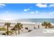 Expansive ocean view from property with palm trees on sandy beach at 9550 Shore Dr. # 226, Myrtle Beach, SC 29572