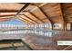 Bright indoor pool area features a wooden ceiling, and brick surround, and leads to an outdoor ocean view at 9550 Shore Dr. # 226, Myrtle Beach, SC 29572