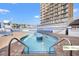 Community pool with multiple levels in front of a high rise building at 9550 Shore Dr. # 226, Myrtle Beach, SC 29572