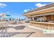 Outdoor poolside bar and seating area with ocean views and sunny sky at 9550 Shore Dr. # 226, Myrtle Beach, SC 29572