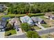 Aerial view of home with a pond, lush landscaping and neighborhood at 985 Shipmaster Ave., Myrtle Beach, SC 29579