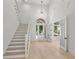 Grand foyer with high ceilings, hardwood floors, and natural light at 985 Shipmaster Ave., Myrtle Beach, SC 29579