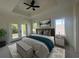 Spacious main bedroom with lots of natural light, tray ceilings and balcony access at 985 Shipmaster Ave., Myrtle Beach, SC 29579