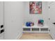 Clean mud room with built-in bench and coat rack at 985 Shipmaster Ave., Myrtle Beach, SC 29579